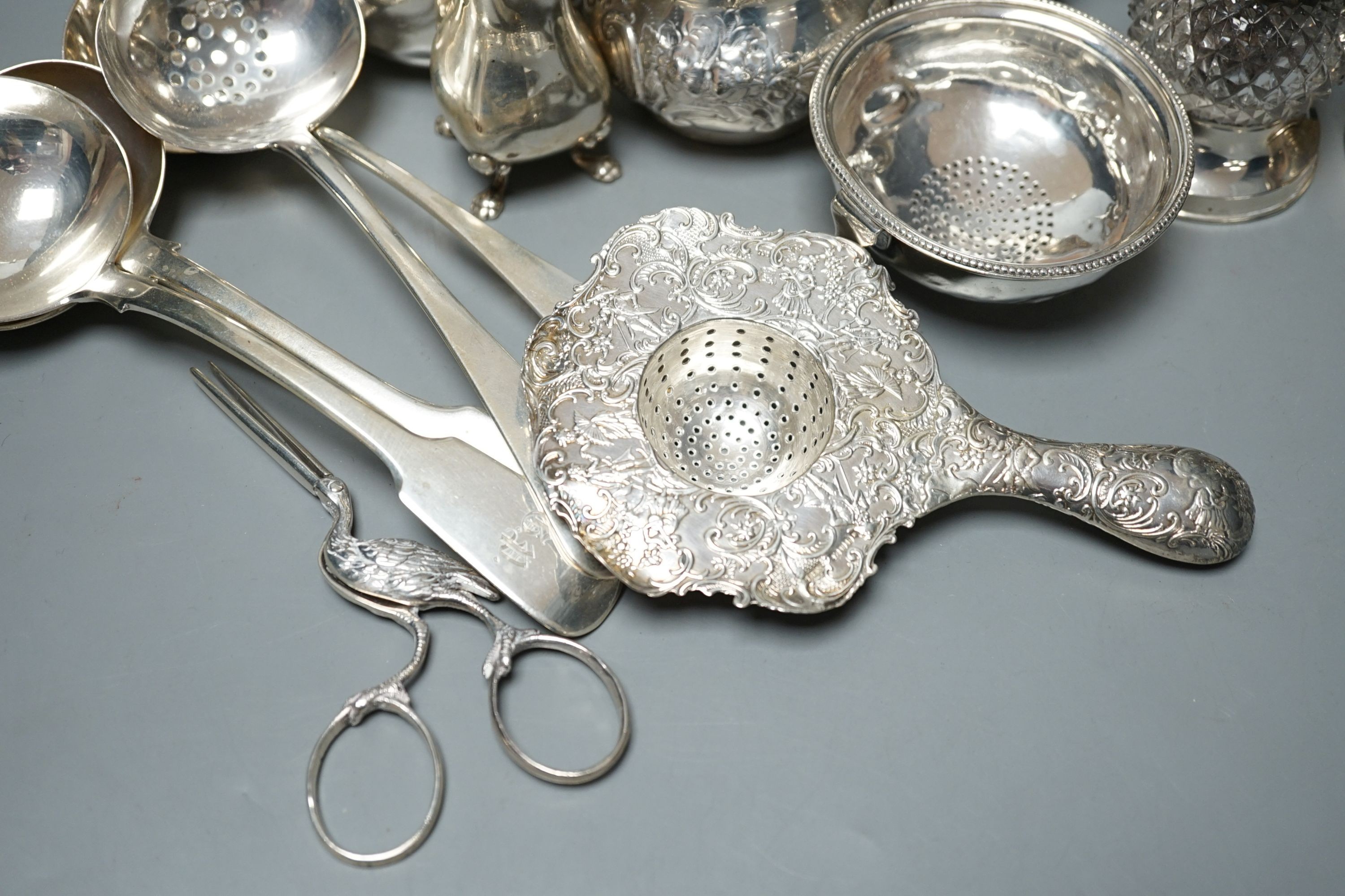 A mixed collection of small silver and sterling items, to include five assorted small ladles, cream jugs, Georgian mustard, bowls etc.